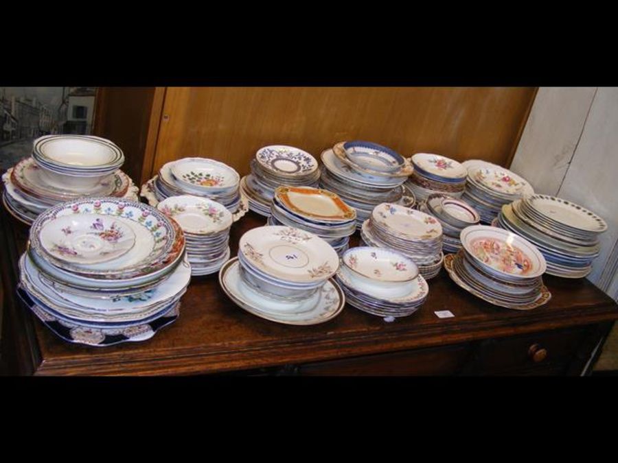 Assorted vintage saucers and plates