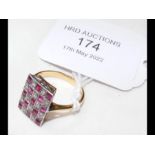 An 18ct gold ring with ruby and diamond checkerboa