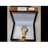 A Claude Valentini wrist watch with gold plated st