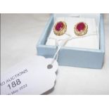 A pair of 18ct gold ruby and diamond earrings