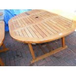 An oval garden table - length 180cms