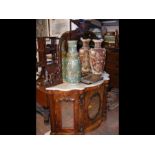 A Victorian walnut credenza with marble top and mi