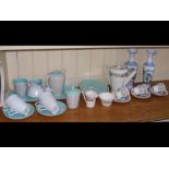 A medley of two tone Poole Pottery tea ware and Ar