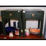 A pair of green lacquered bedside tables