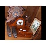 A cuckoo clock, a mantel clock, picture of Red Rid