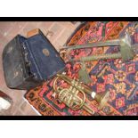 An old Boosey & Co cornet in carrying case togethe