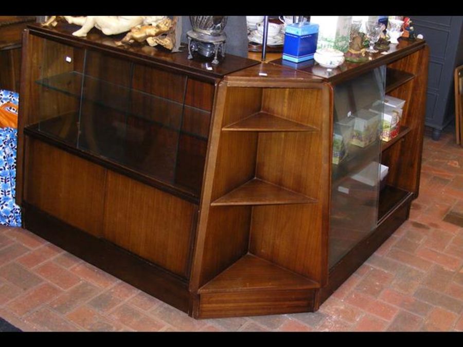 Two 1950's walnut bookcases together with the inse