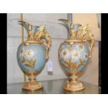 A pair of decorative Royal Worcester ewers - RD No