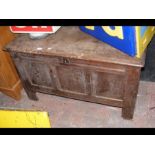 A period oak coffer with panelled front - 95cm