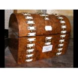 A Victorian walnut dome top stationery box
