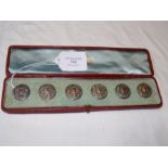 A cased set of six silver pierced buttons by Packe