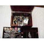 A jewellery box containing various gold and costum