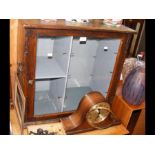 An Edwardian oak travelling salesman's cabinet