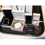 Pandora bracelets with original boxes, etc.