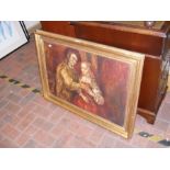 A gilt framed oil painting of two figures
