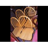 A set of four spindle back chairs