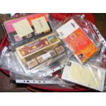 A large collection of stamp packs
