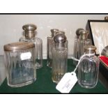 A selection of silver top scent bottles