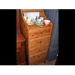 A tall pine chest of five drawers - width 50cms