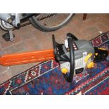 A Ryobi petrol chainsaw