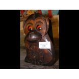 An unusual carved wooden 'Monkey' mantel clock wit
