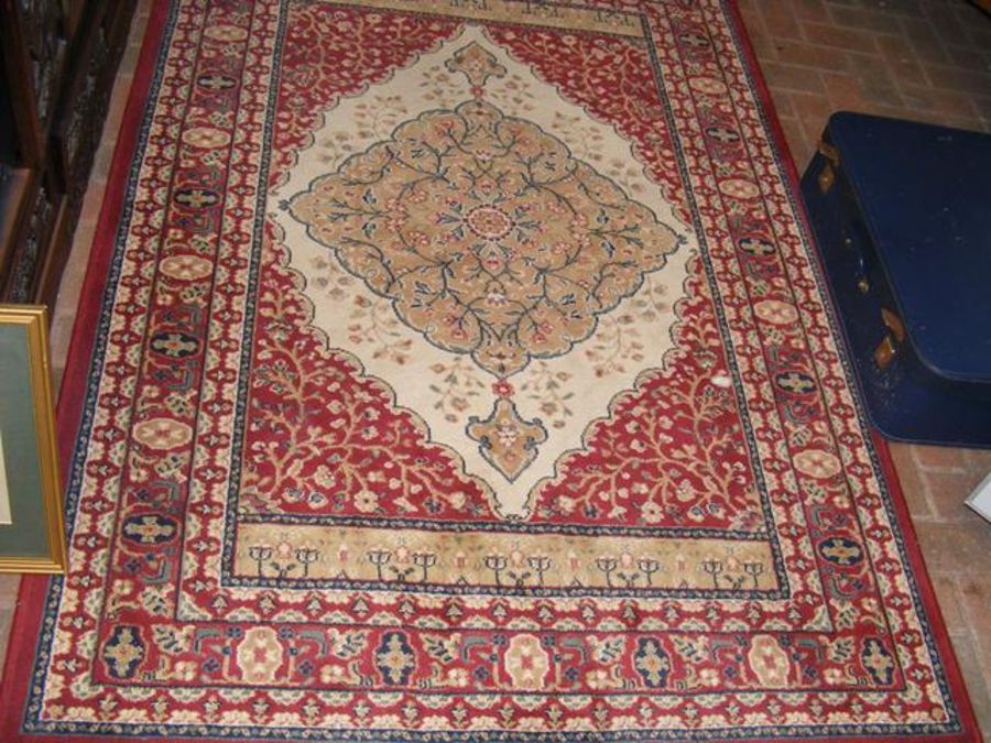 A small Middle Eastern style rug with geometric bo