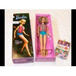 A boxed Barbie ash blonde doll by Mattel with life