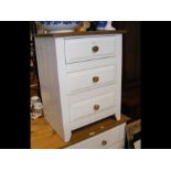 The matching bedside chest of three drawers