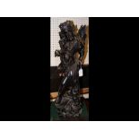 A carved wooden oriental figure of dancing deity -