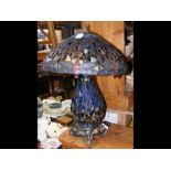 A reproduction Tiffany style table lamp with shade