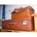 A vintage leather Gladstone style case together wi