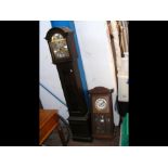 A reproduction Grandmother clock together with a w