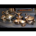 A four piece silver plated tea set together with a