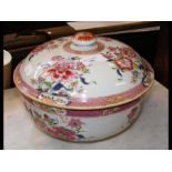 A Chinese Famille Rose bowl and cover with floral