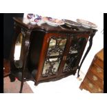An Edwardian two door display cabinet with cabriol