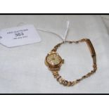 A ladies 9ct gold wristwatch