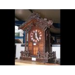 A Black Forest cuckoo clock of rustic design