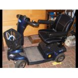 An Invacare Leo four wheel mobility scooter in blu