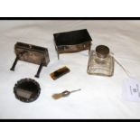 A miniature silver dressing table, etc.