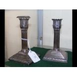 A pair of 15cm high silver candlesticks - London h