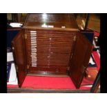 A multi-draw Victorian mahogany coin collectors ca