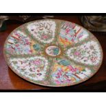 A 41cm diameter Famille Rose charger with figural