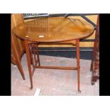 An oval Edwardian occasional table with Art Nouvea