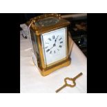 A 14cm high brass cased carriage clock