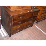 A four drawer oak antique chest