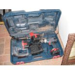 A Bosch hammer drill, cordless drill, together wit