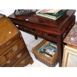 A Chinese hardwood side table - 92cm