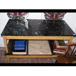 A pair of marble top rectangular coffee tables