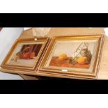 A pair of oil still life in gilt frames