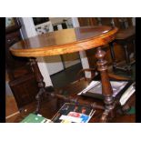 An inlaid oval occasional table
